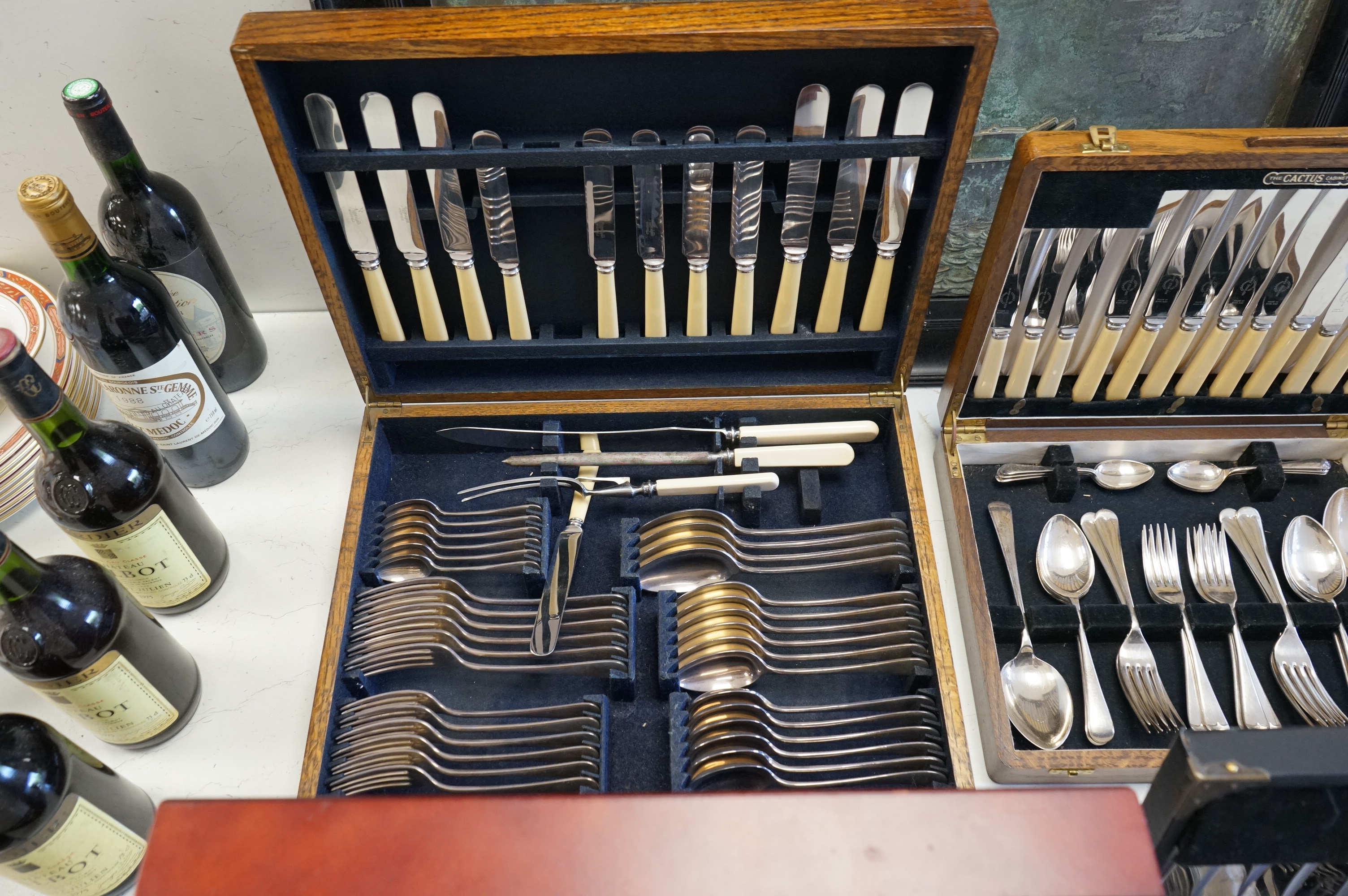 Four cased canteens of silver plated flatware including Kings pattern and Mappin plate